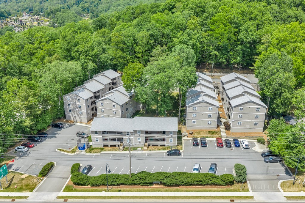 229 East King Street, Unit 30 Boone, NC 28607 - Photo 2 of 19 an aerial view of residential houses with outdoor space and trees