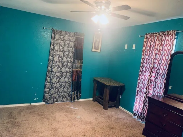 a bathroom with a sink and toilet