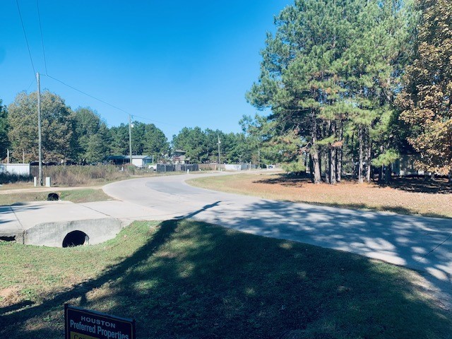 284 County Road 3405 Cleveland, TX 77327 - Photo 4 of 22 a view of a yard