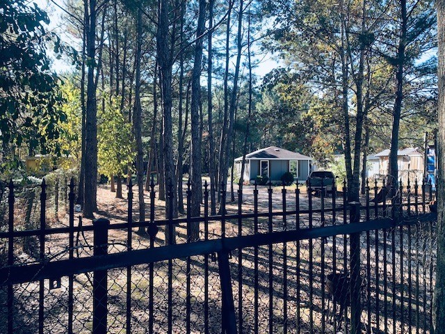 284 County Road 3405 Cleveland, TX 77327 - Photo 5 of 22 a front view of a house