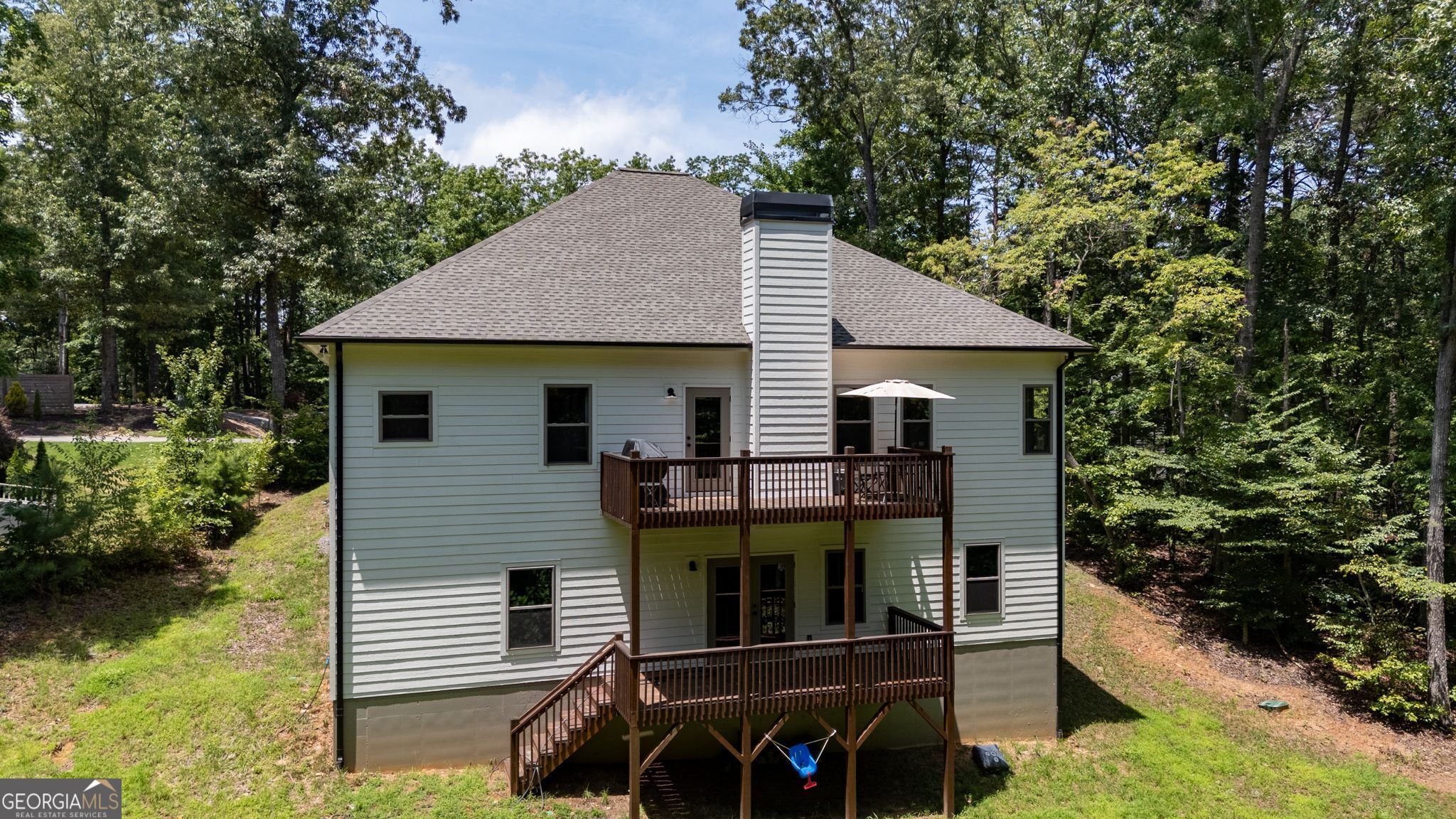 146 Hackney Trail Ellijay, GA 30536 - Photo 13 of 24 a view of a house with backyard