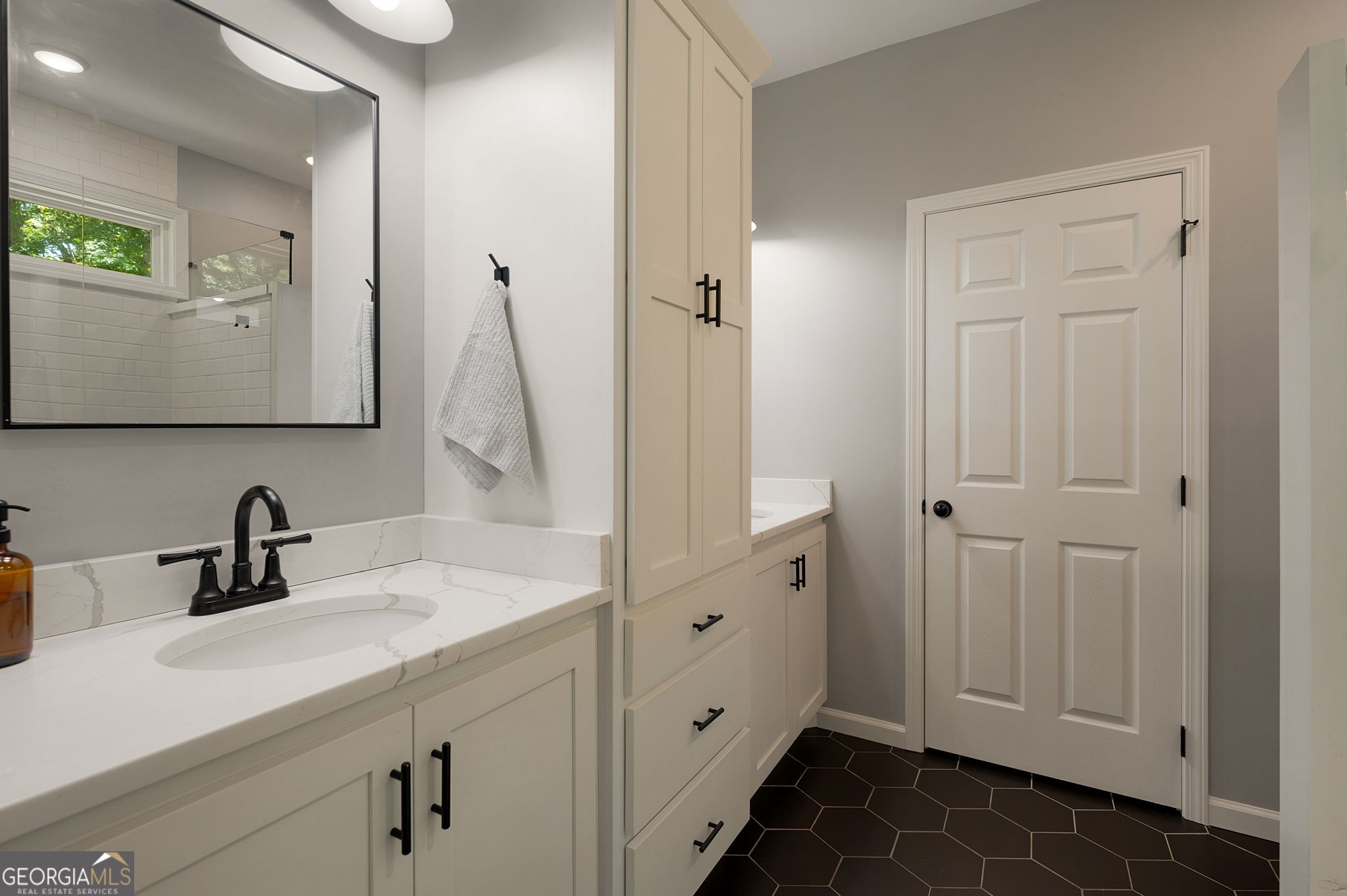 146 Hackney Trail Ellijay, GA 30536 - Photo 14 of 24 a bathroom with a sink and a mirror