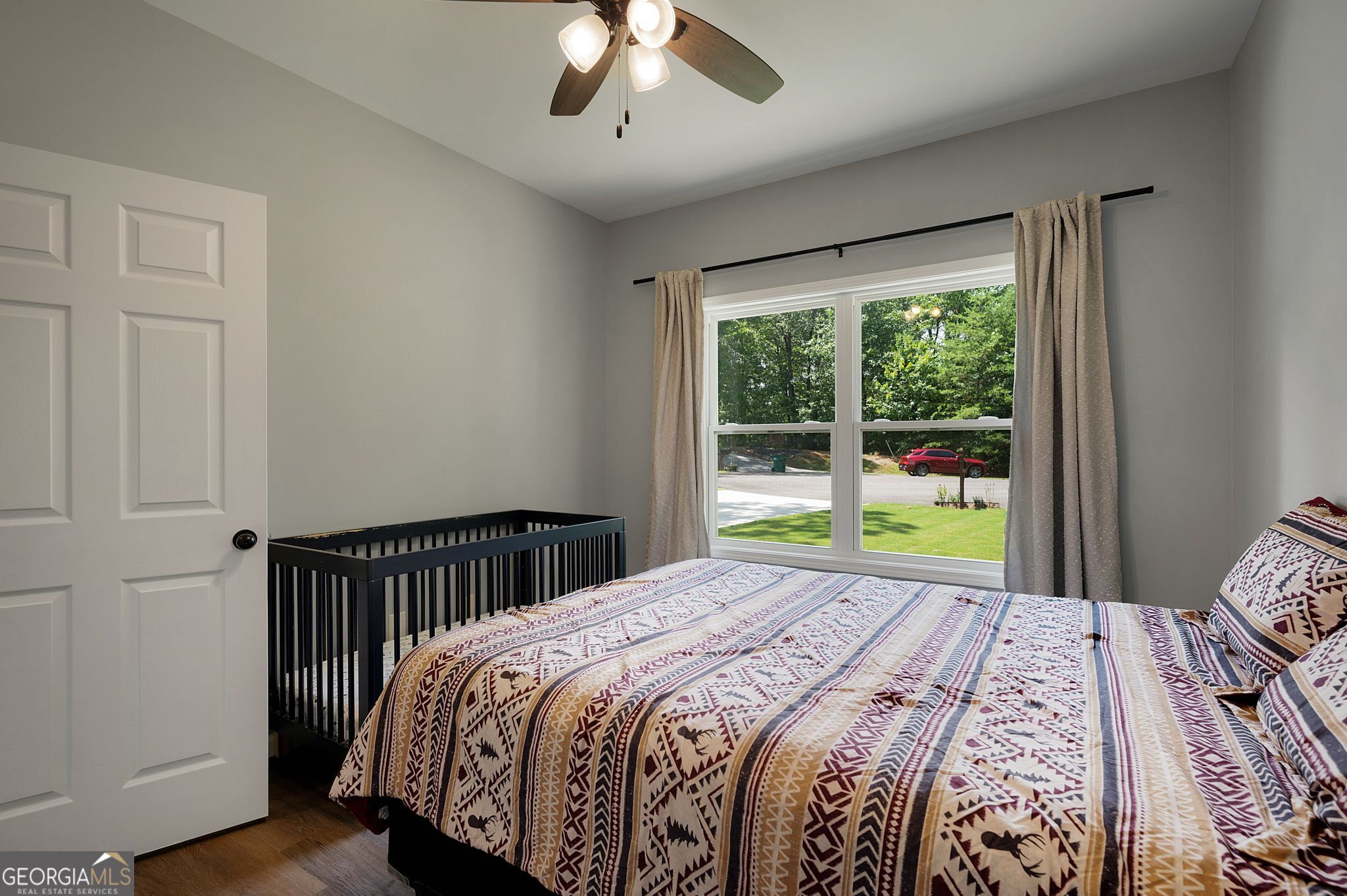 146 Hackney Trail Ellijay, GA 30536 - Photo 18 of 24 a bedroom with a bed and a window