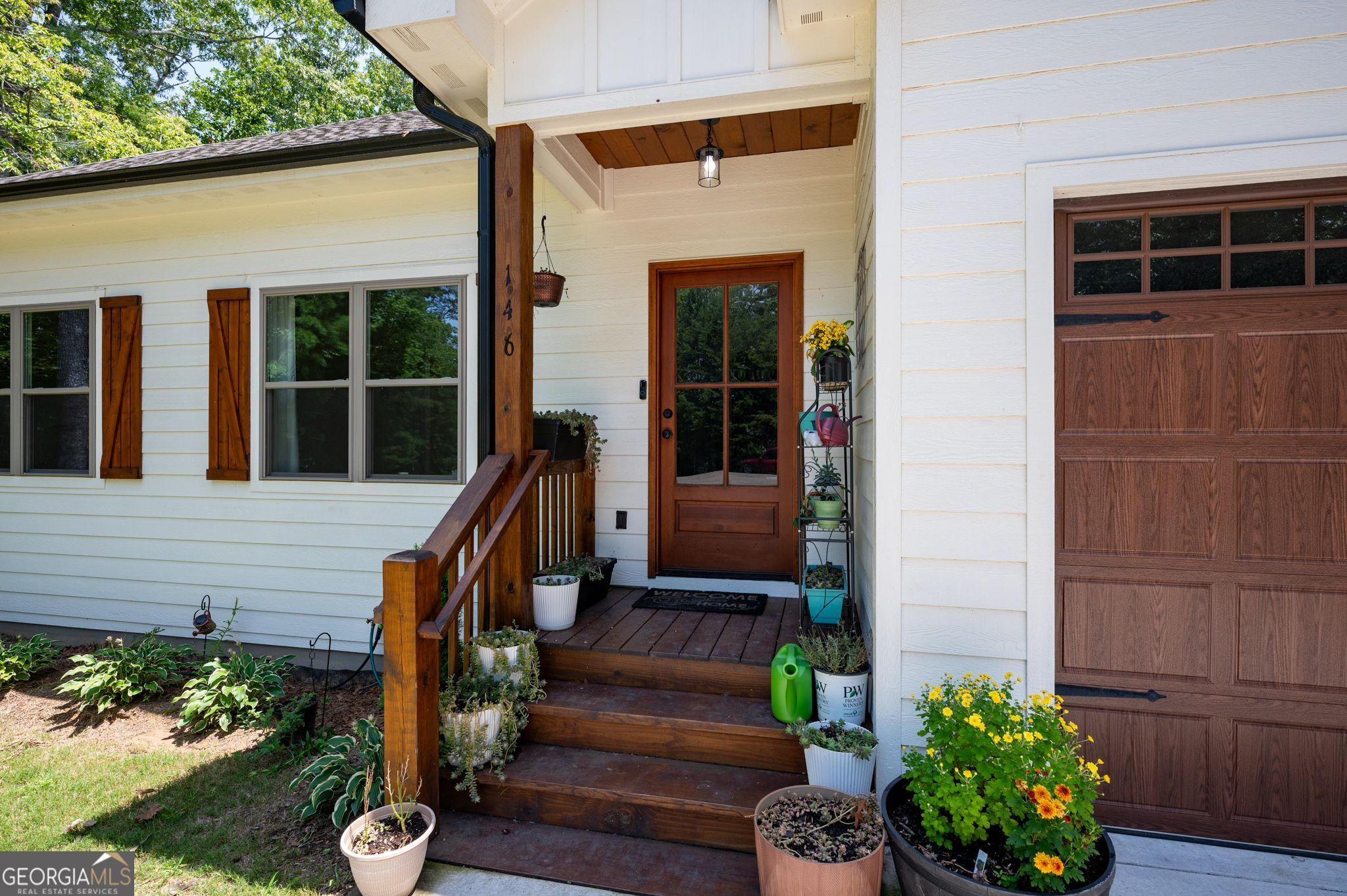 146 Hackney Trail Ellijay, GA 30536 - Photo 2 of 24 a front view of a house with a yard