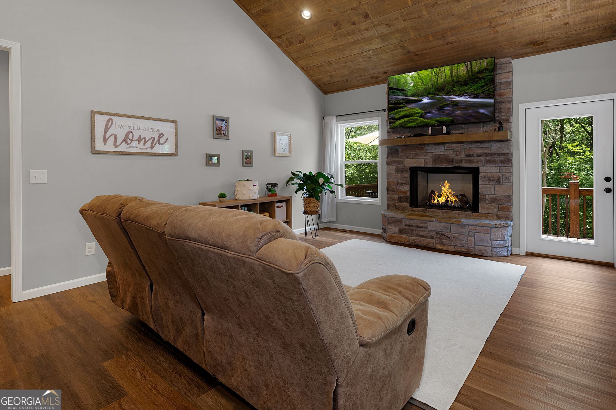 146 Hackney Trail Ellijay, GA 30536 - Photo 7 of 24 a living room with furniture and a fireplace