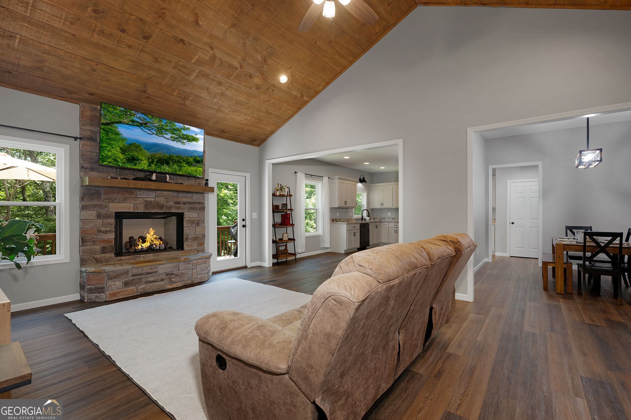146 Hackney Trail Ellijay, GA 30536 - Photo 8 of 24 a living room with furniture and a fireplace