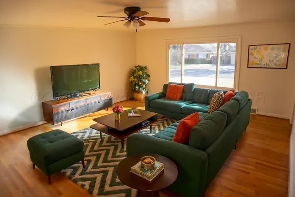 a kitchen with a refrigerator and a sink