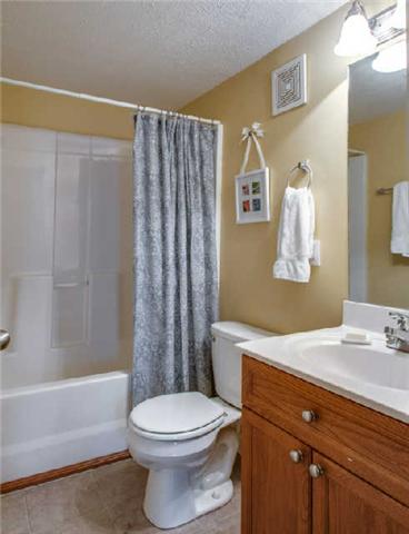 420 Elysian Fields Road, Unit E10 Nashville, TN 37211 - Photo 12 of 20 a bathroom with a sink a toilet and shower
