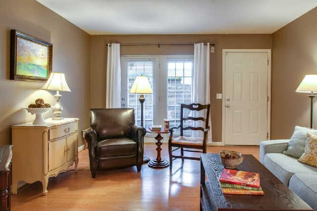 420 Elysian Fields Road, Unit E10 Nashville, TN 37211 - Photo 2 of 20 a living room with furniture and wooden floor