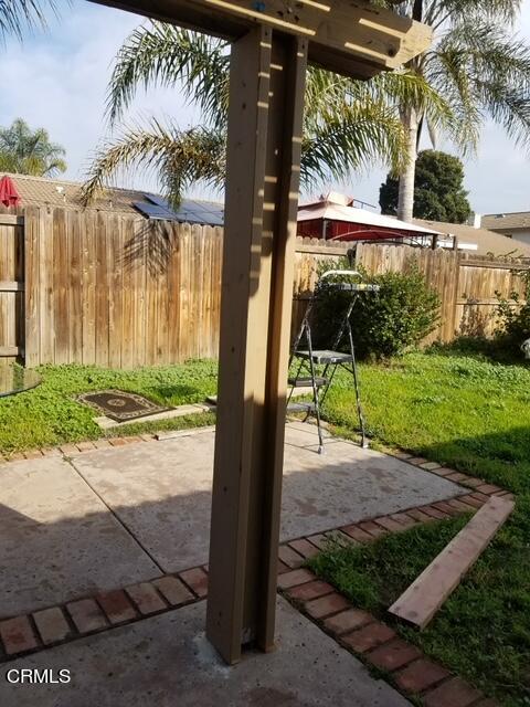 851 Almendra Place Oxnard, CA 93036 - Photo 7 of 7 a view of a yard with a tree