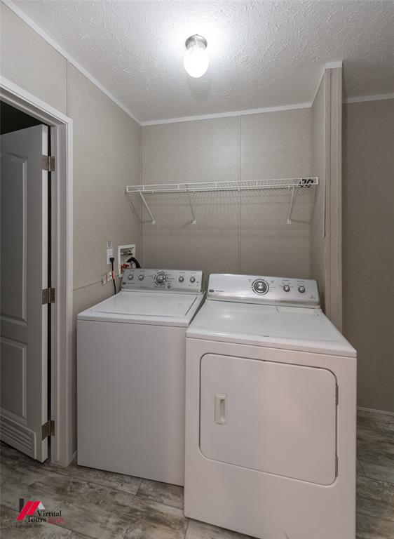 2470 Highway 792 Heflin, LA 71039 - Photo 19 of 25 a utility room with dryer and washer