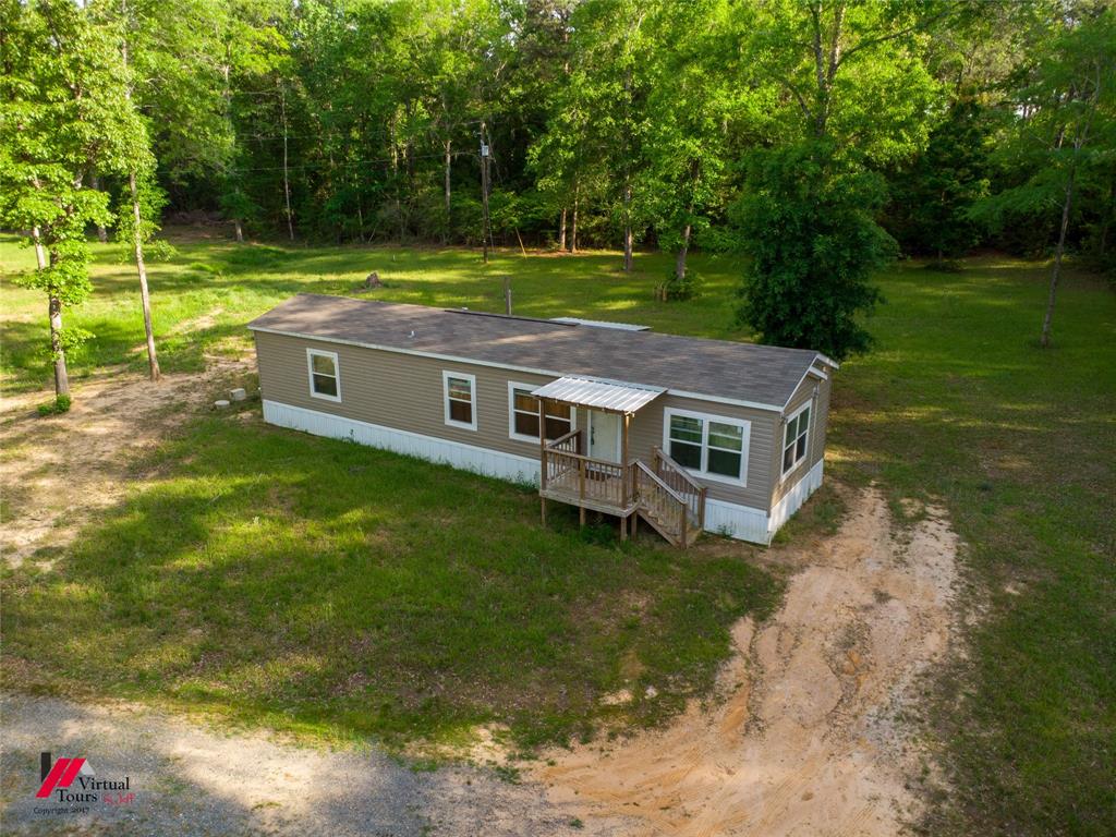 2470 Highway 792 Heflin, LA 71039 - Photo 2 of 25 a view of a house with a yard
