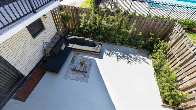 a view of a house with a yard and plants