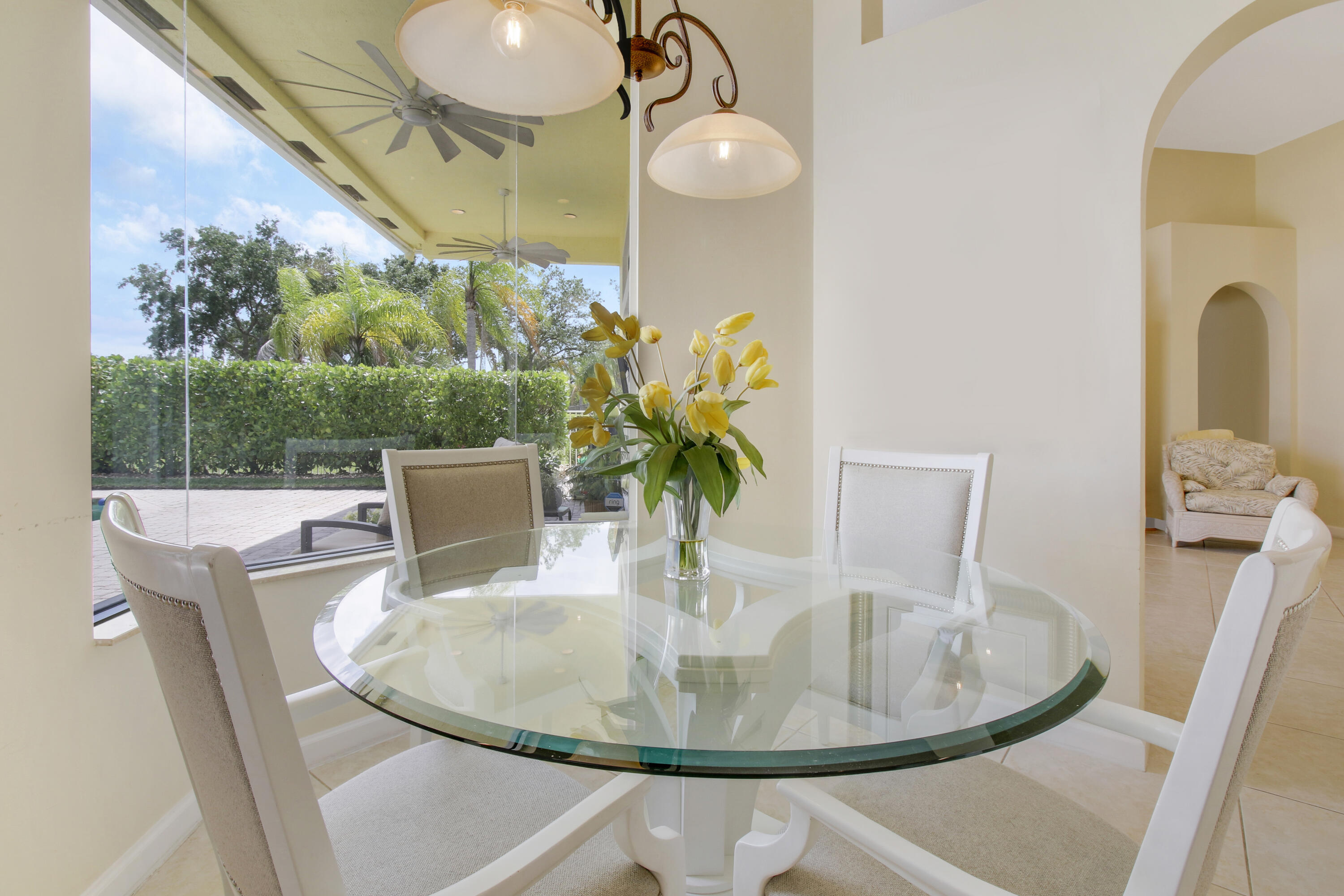 660 Southwest Yacht Basin Way Stuart, FL 34997 - Photo 16 of 42 a dining room with furniture and wooden floor