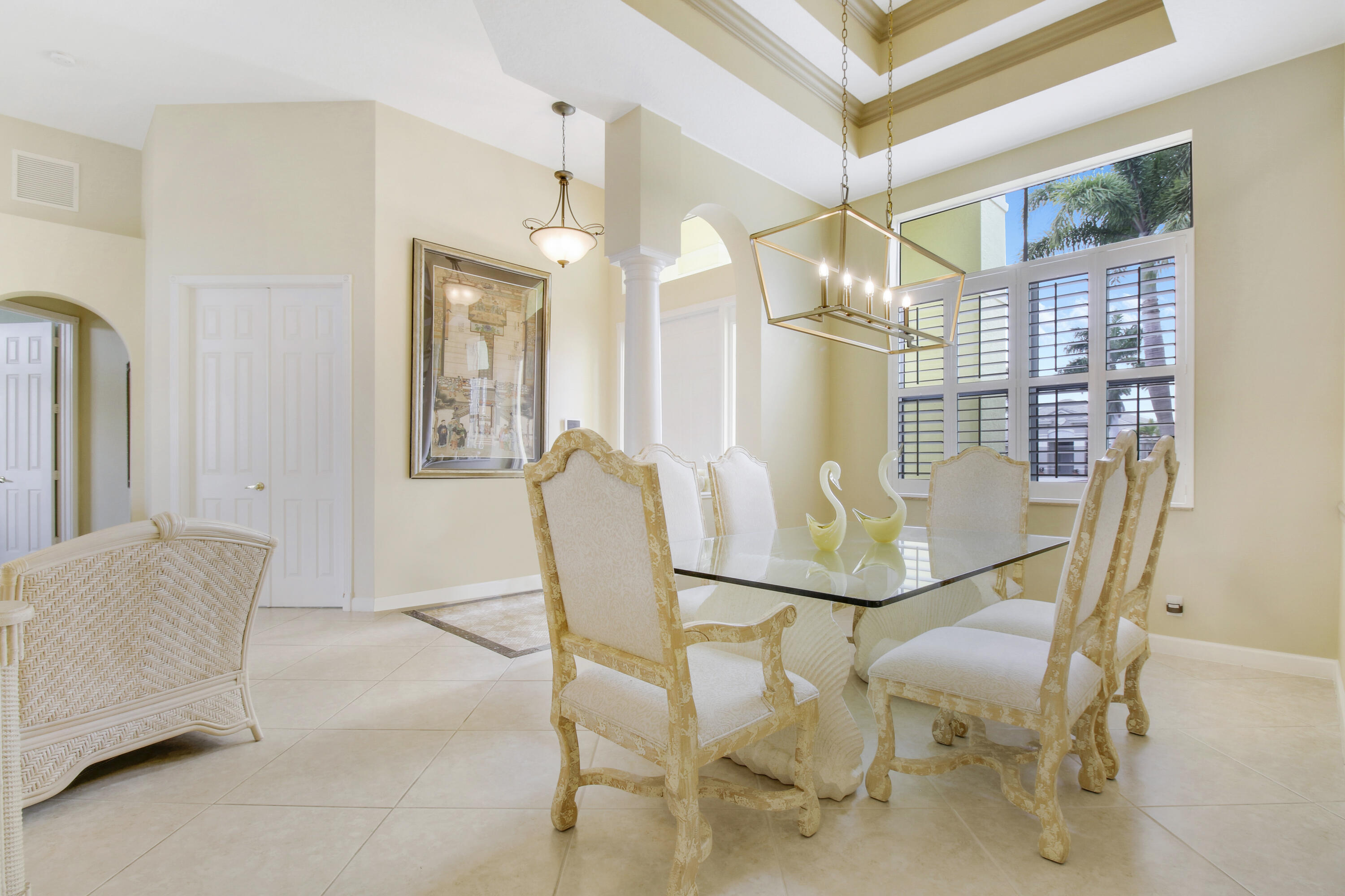 660 Southwest Yacht Basin Way Stuart, FL 34997 - Photo 26 of 42 a view of a dining room with furniture and a chandelier