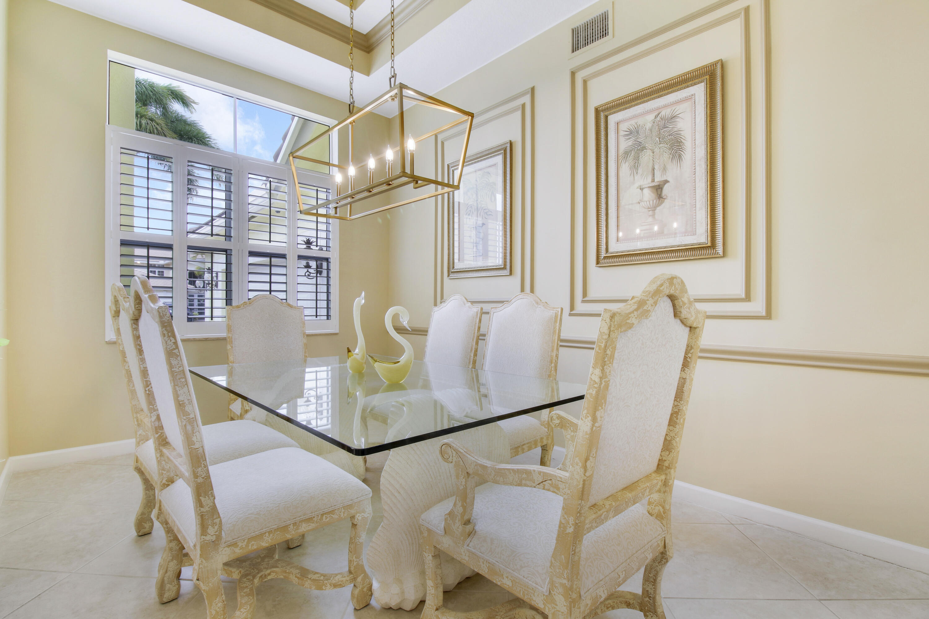 660 Southwest Yacht Basin Way Stuart, FL 34997 - Photo 27 of 42 a dining room with furniture and window