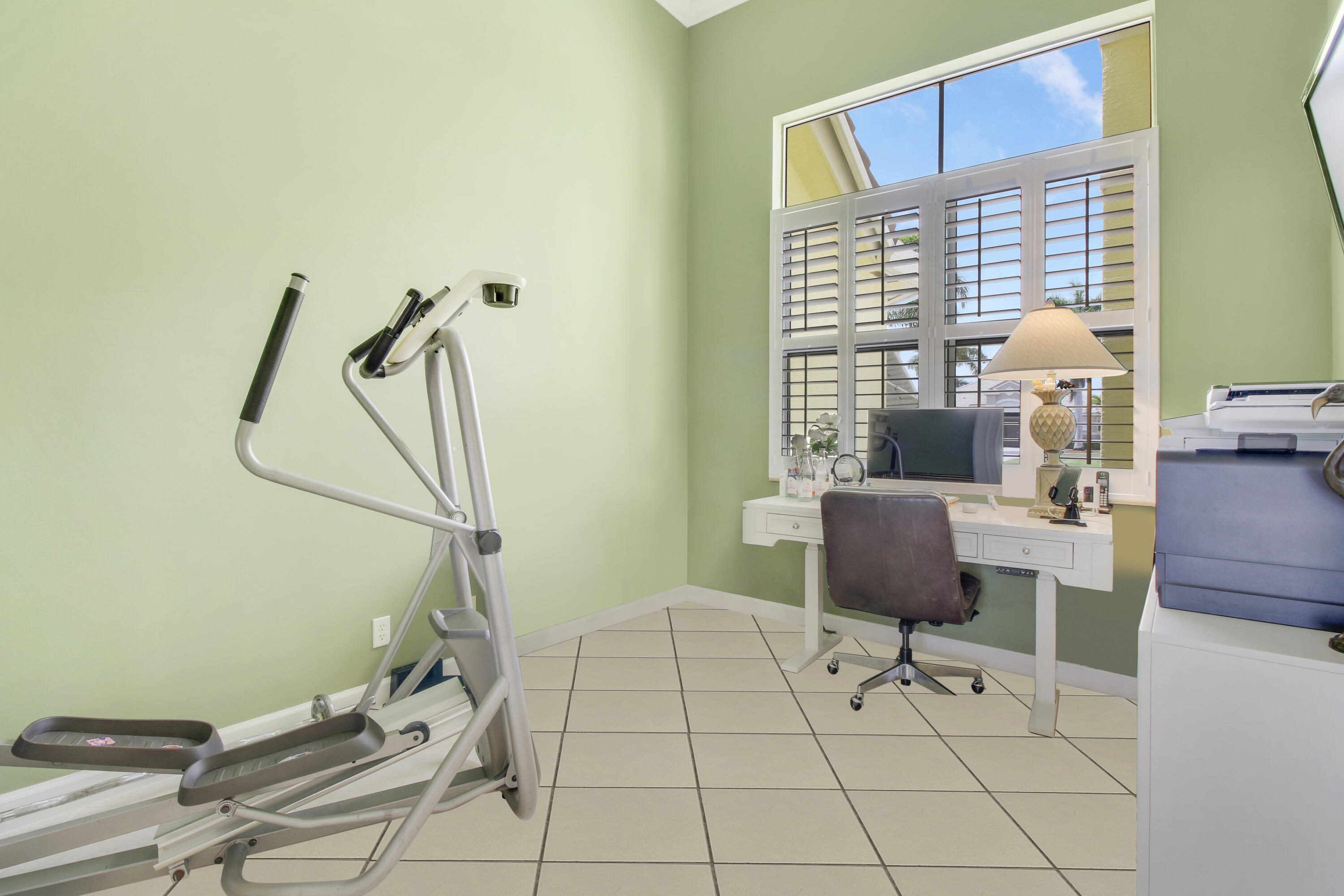 660 Southwest Yacht Basin Way Stuart, FL 34997 - Photo 28 of 42 a view of a workspace with furniture and a window