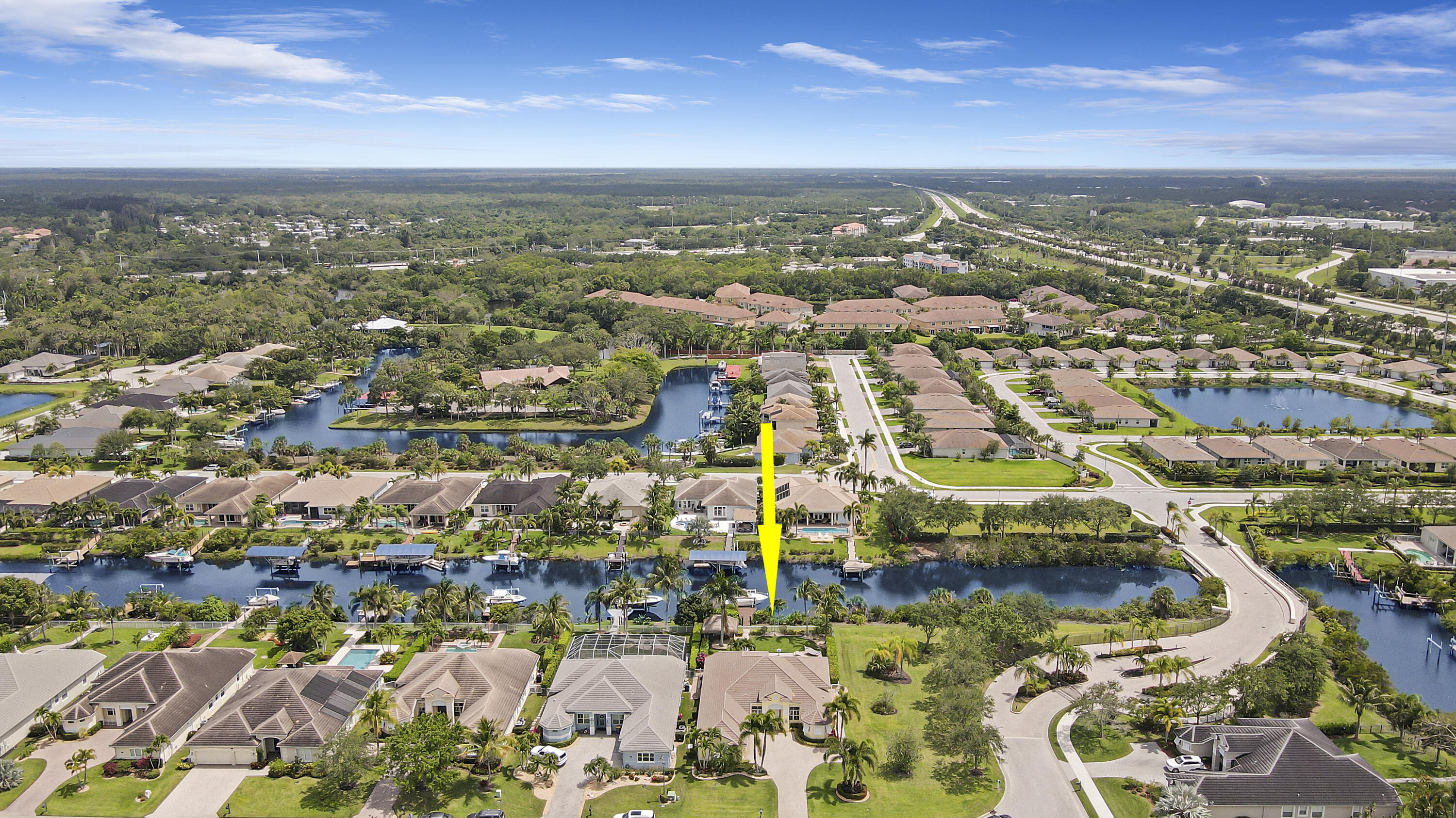 660 Southwest Yacht Basin Way Stuart, FL 34997 - Photo 37 of 42 an aerial view of residential building and lake