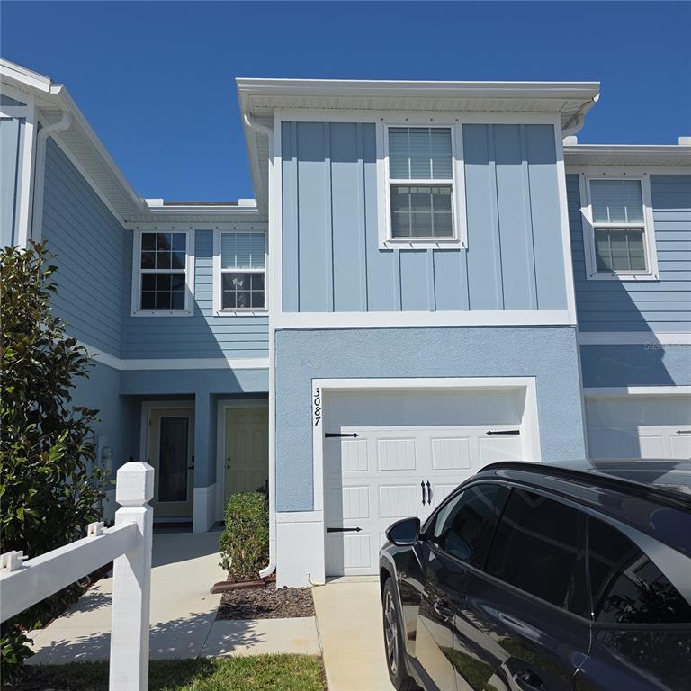3087 Victoria Inlet Drive Holiday, FL 34691 - Photo 18 of 46 a front view of a house with garden