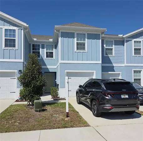 a car parked in front of a house