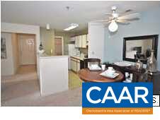 200 Lake Club Court, Unit 3 Charlottesville, VA 22902 - Photo 7 of 16 a bathroom with a sink a mirror and a bathtub