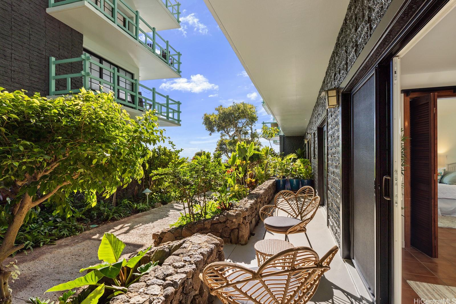 2957 Kalakaua Avenue, Unit 102 Honolulu, HI 96815 - Photo 3 of 15 a view of a chairs and table in a balcony