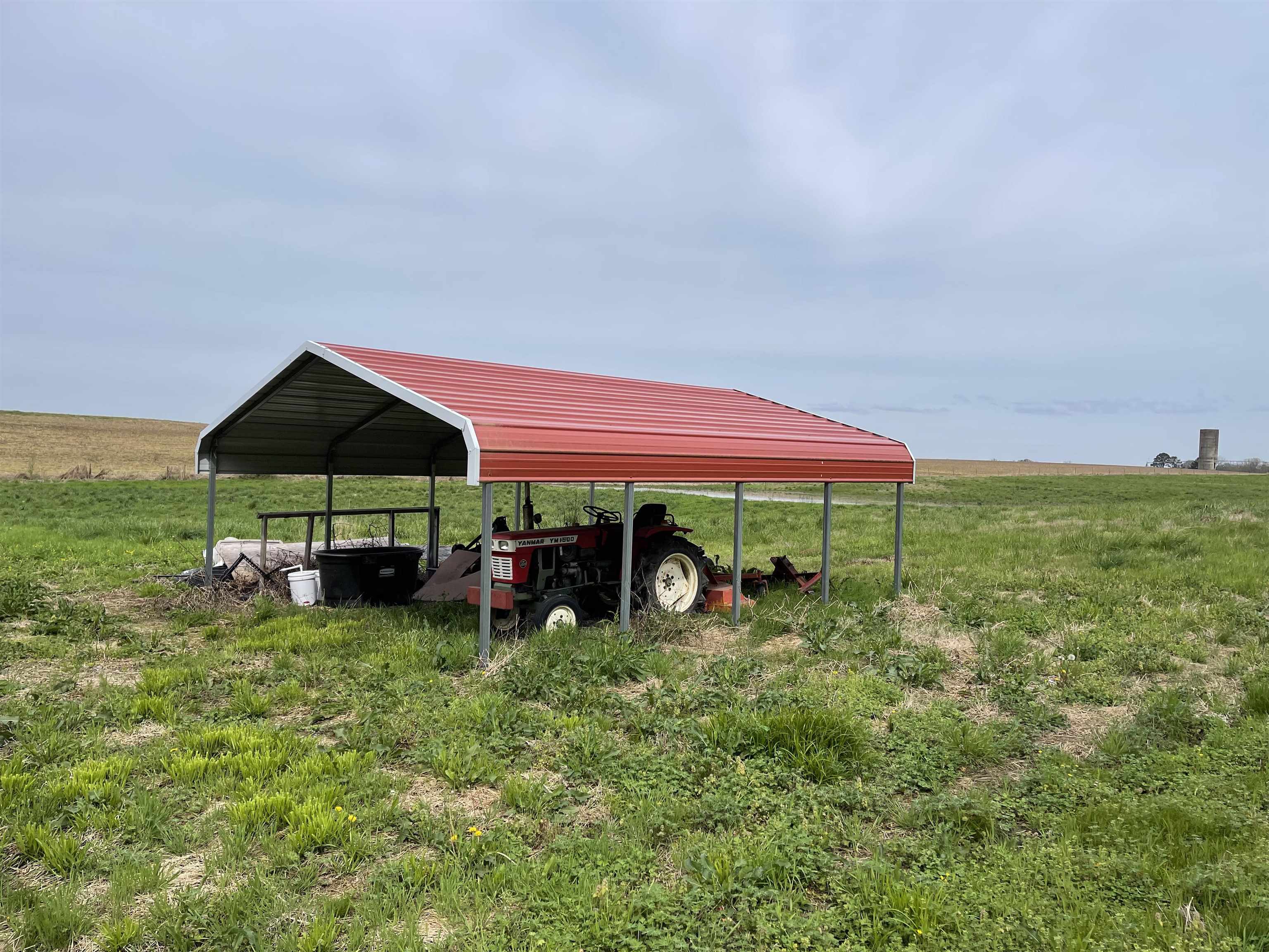 240 Johns Road Toone, TN 38381 - Photo 21 of 22 a view of a house with yard and sitting area