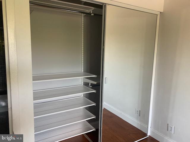 300 M Street Southwest, Unit N411 Washington, DC 20024 - Photo 9 of 13 a view of walk in closet with empty racks