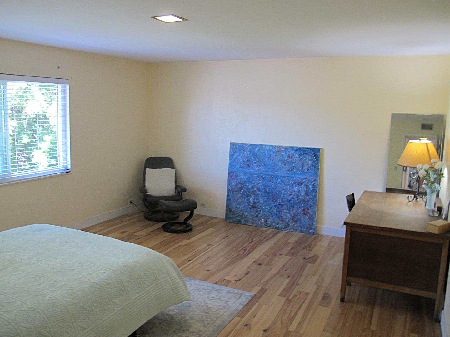 328 Main Street, Unit 13 Santa Cruz, CA 95060 - Photo 12 of 27 a bedroom with a bed and a table in it