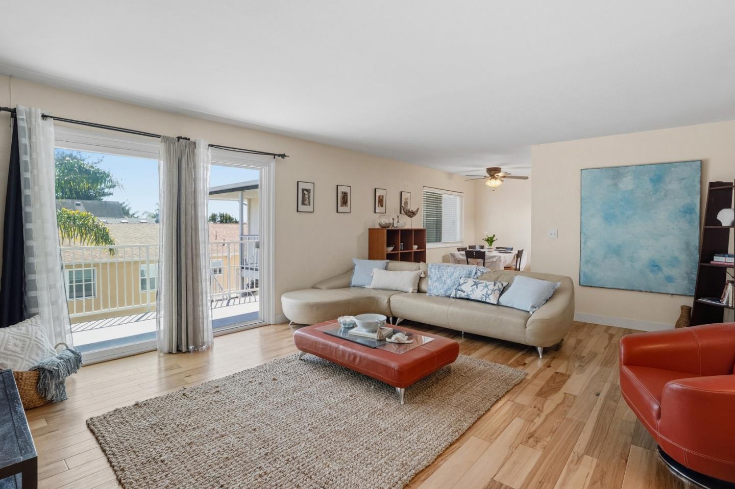 328 Main Street, Unit 13 Santa Cruz, CA 95060 - Photo 10 of 27 a living room with furniture and a rug