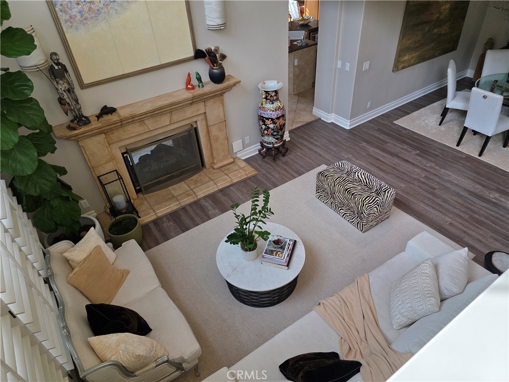 17 Avignon Newport Coast, CA 92657 - Photo 16 of 19 a living room with furniture and a fireplace