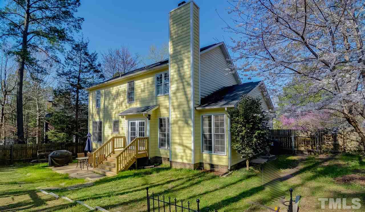 4404 Labrador Drive Raleigh, NC 27616 - Photo 17 of 25 a view of a house with backyard and sitting area