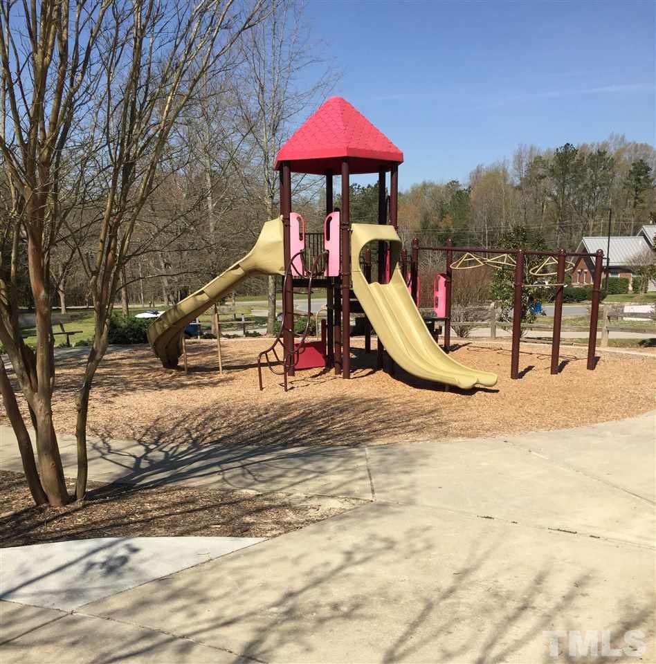 4404 Labrador Drive Raleigh, NC 27616 - Photo 21 of 25 a view of a park with slide