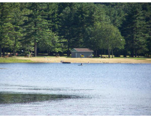 18 Blodgett Road Holland, MA 01521 - Photo 13 of 13 a view of a swimming pool with an outdoor space and seating area
