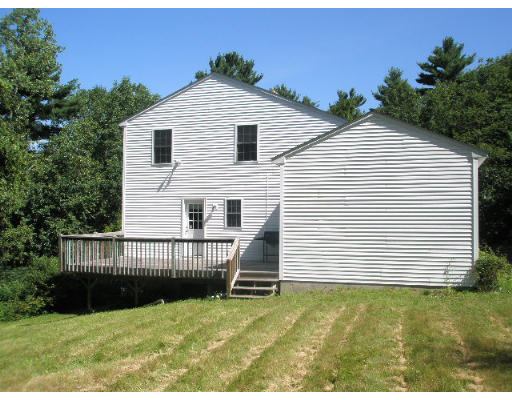 18 Blodgett Road Holland, MA 01521 - Photo 2 of 13 a view of backyard of house