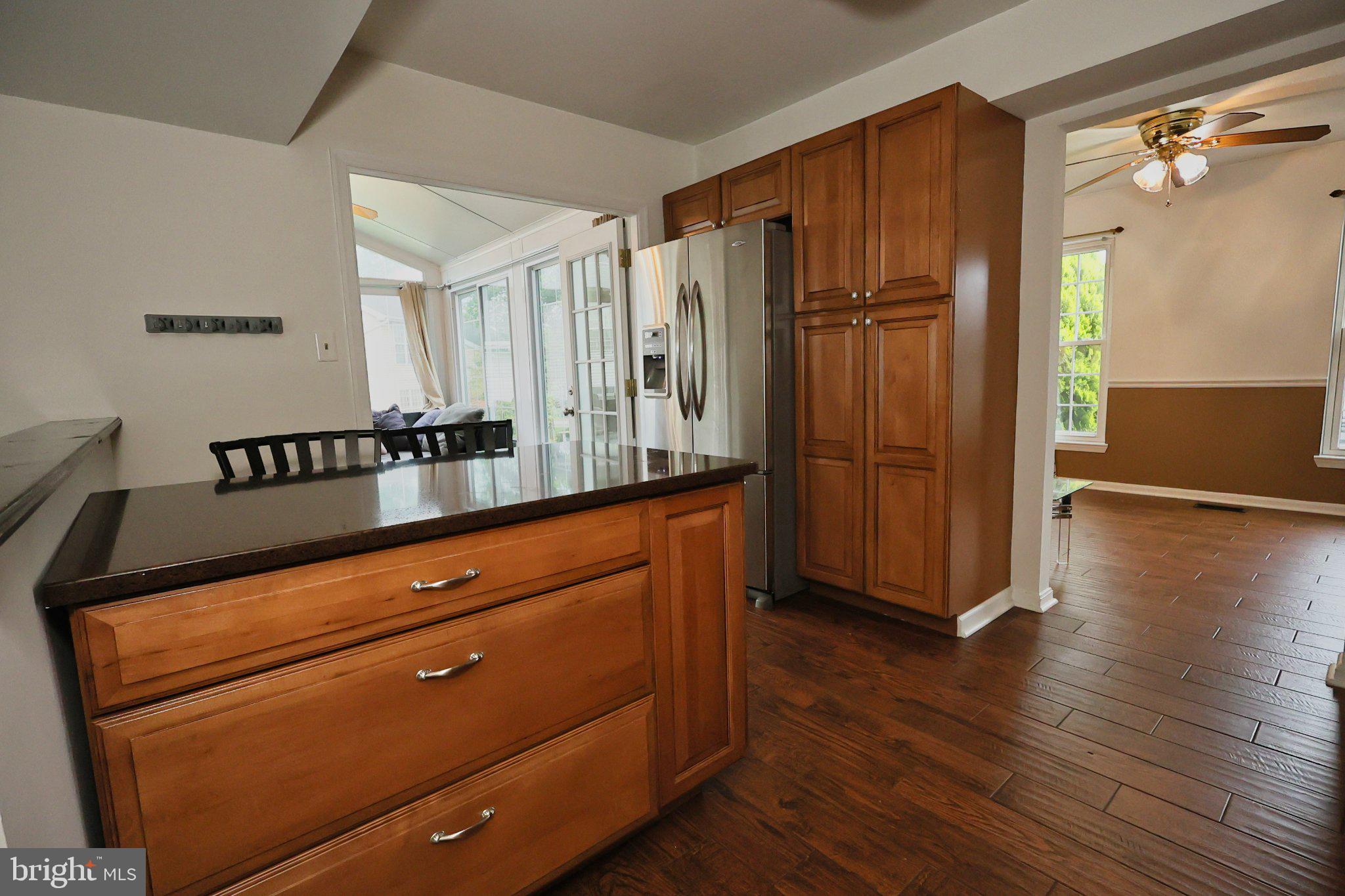 4402 Fieldgreen Road Nottingham, MD 21236 - Photo 21 of 52 Modern kitchen with warm wood accents.