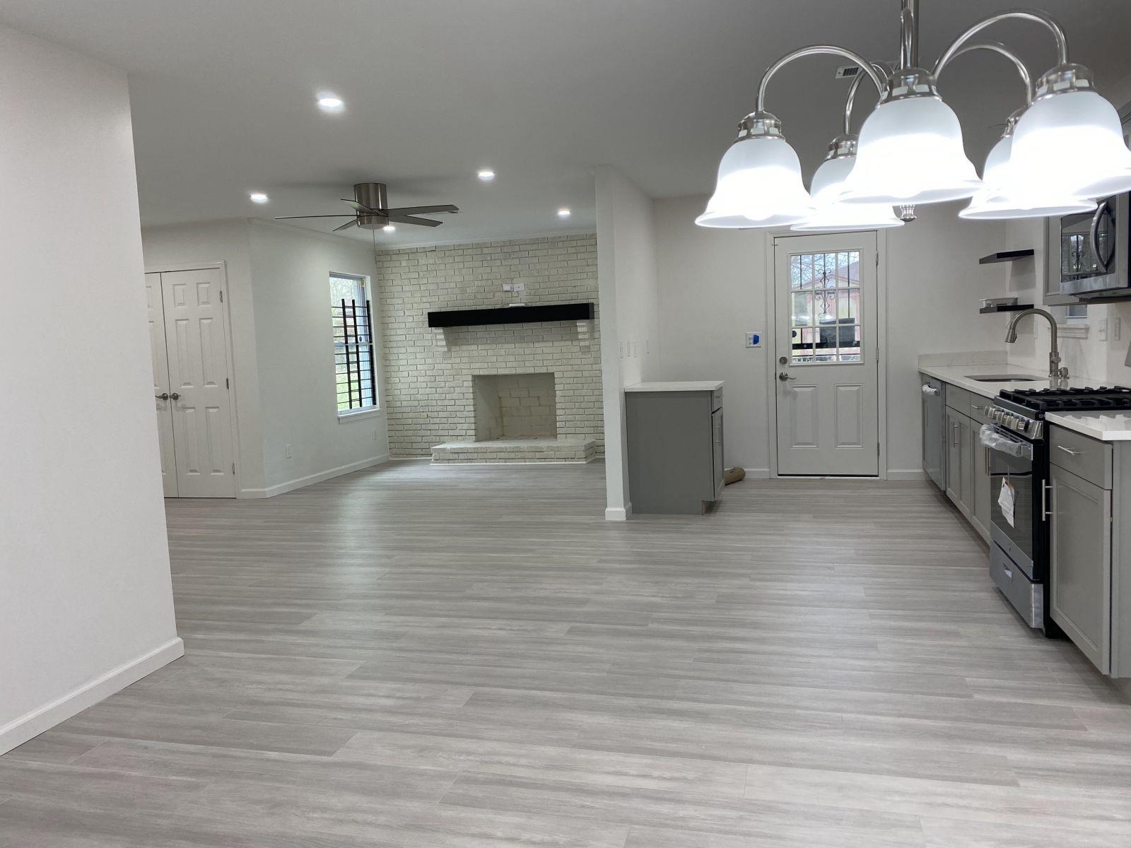 5089 Horn Lake Road Memphis, TN 38109 - Photo 7 of 23 a view of a kitchen with a sink and cabinets