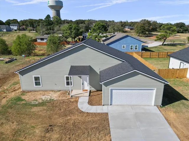 front view of house with a yard