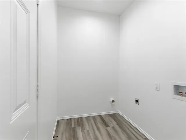 a view of small space with racks on the wall