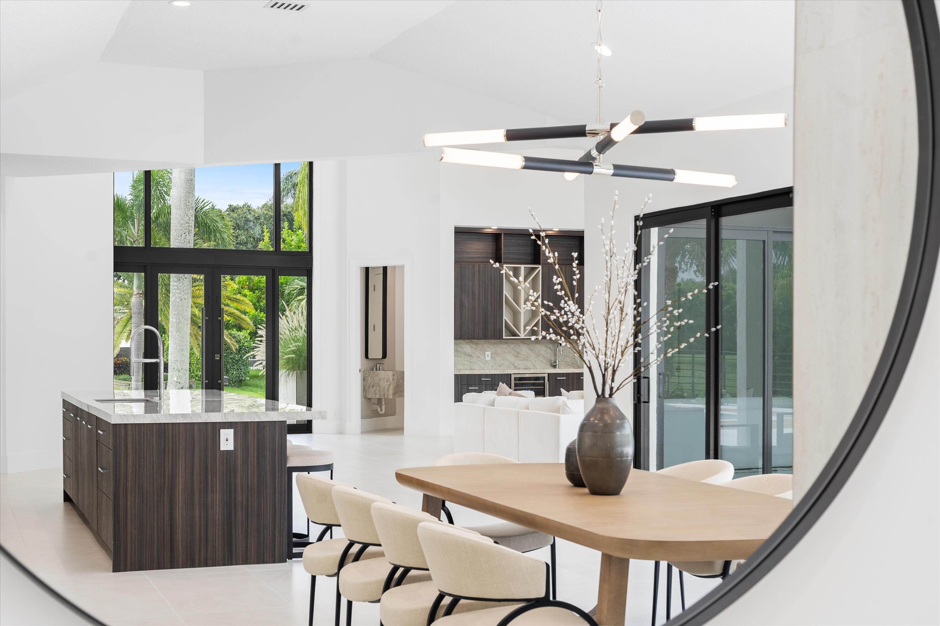 4816 Bocaire Boulevard Boca Raton, FL 33487 - Photo 26 of 61 a view of a dining room with furniture window and outside view