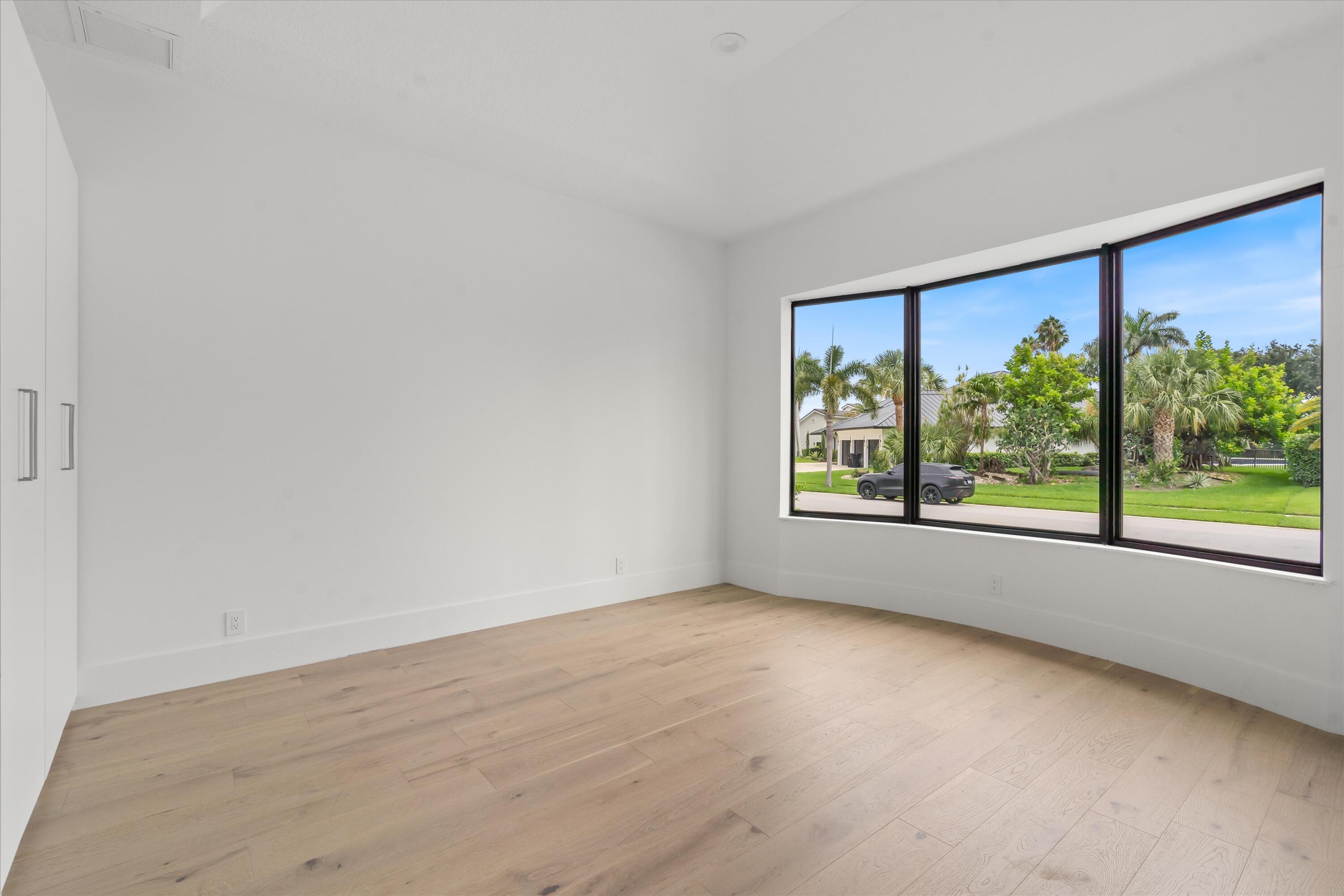 4816 Bocaire Boulevard Boca Raton, FL 33487 - Photo 48 of 61 a view of an empty room with a window