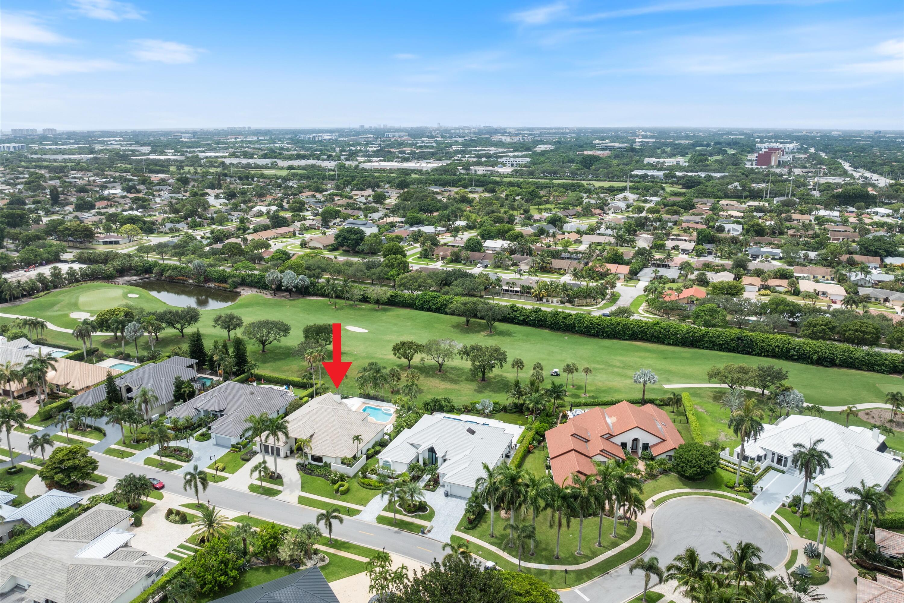 4816 Bocaire Boulevard Boca Raton, FL 33487 - Photo 56 of 61 an aerial view of lake residential houses with outdoor space and swimming