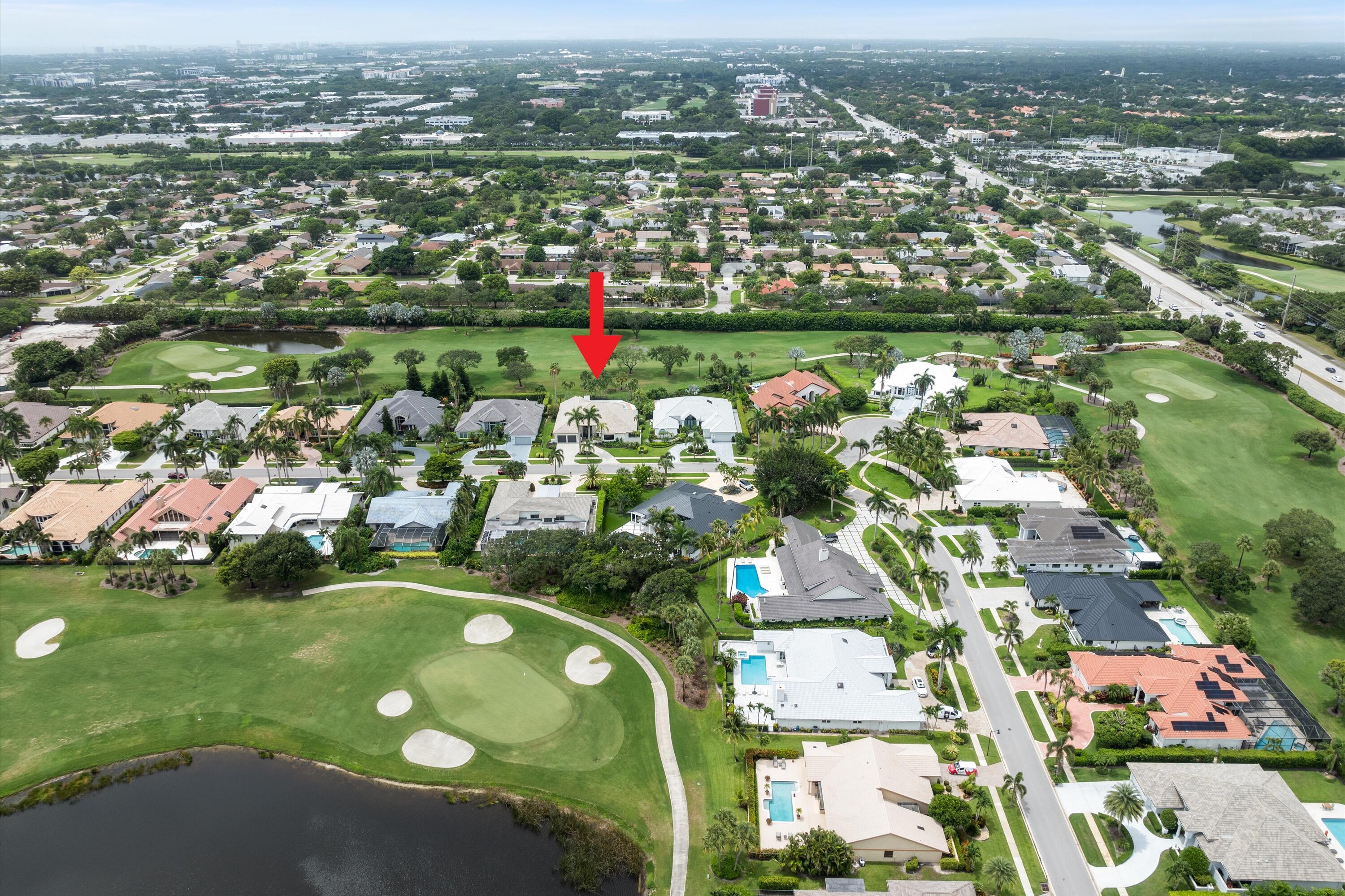 4816 Bocaire Boulevard Boca Raton, FL 33487 - Photo 60 of 61 an aerial view of residential houses with outdoor space and trees
