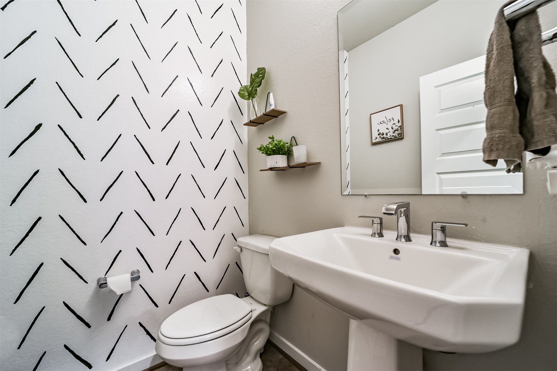 29510 Red Rocks Pk Drive Katy, TX 77494 - Photo 14 of 31 a white sink sitting next to a white toilet and a shower curtain