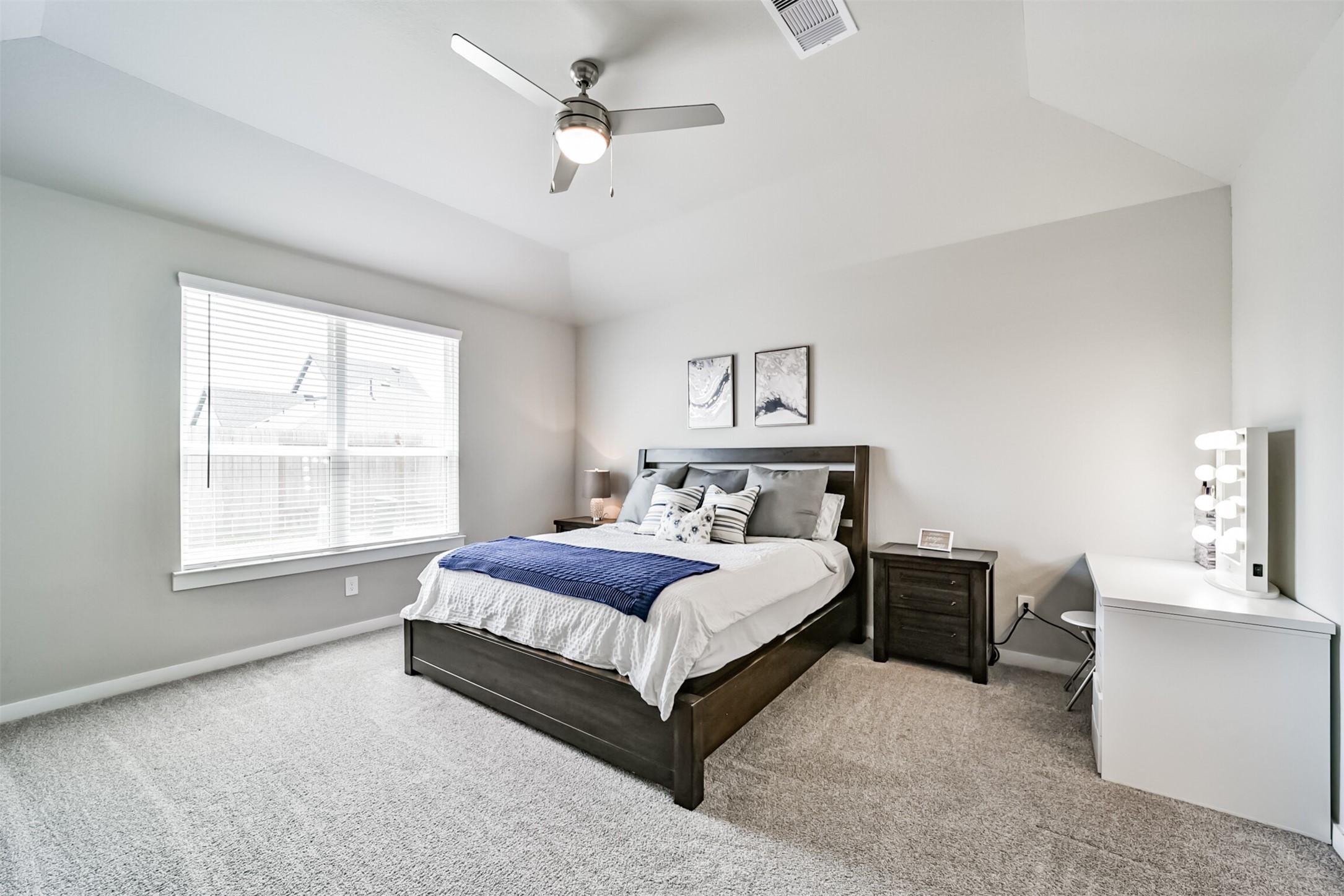 29510 Red Rocks Pk Drive Katy, TX 77494 - Photo 15 of 31 a spacious bedroom with a bed and a table
