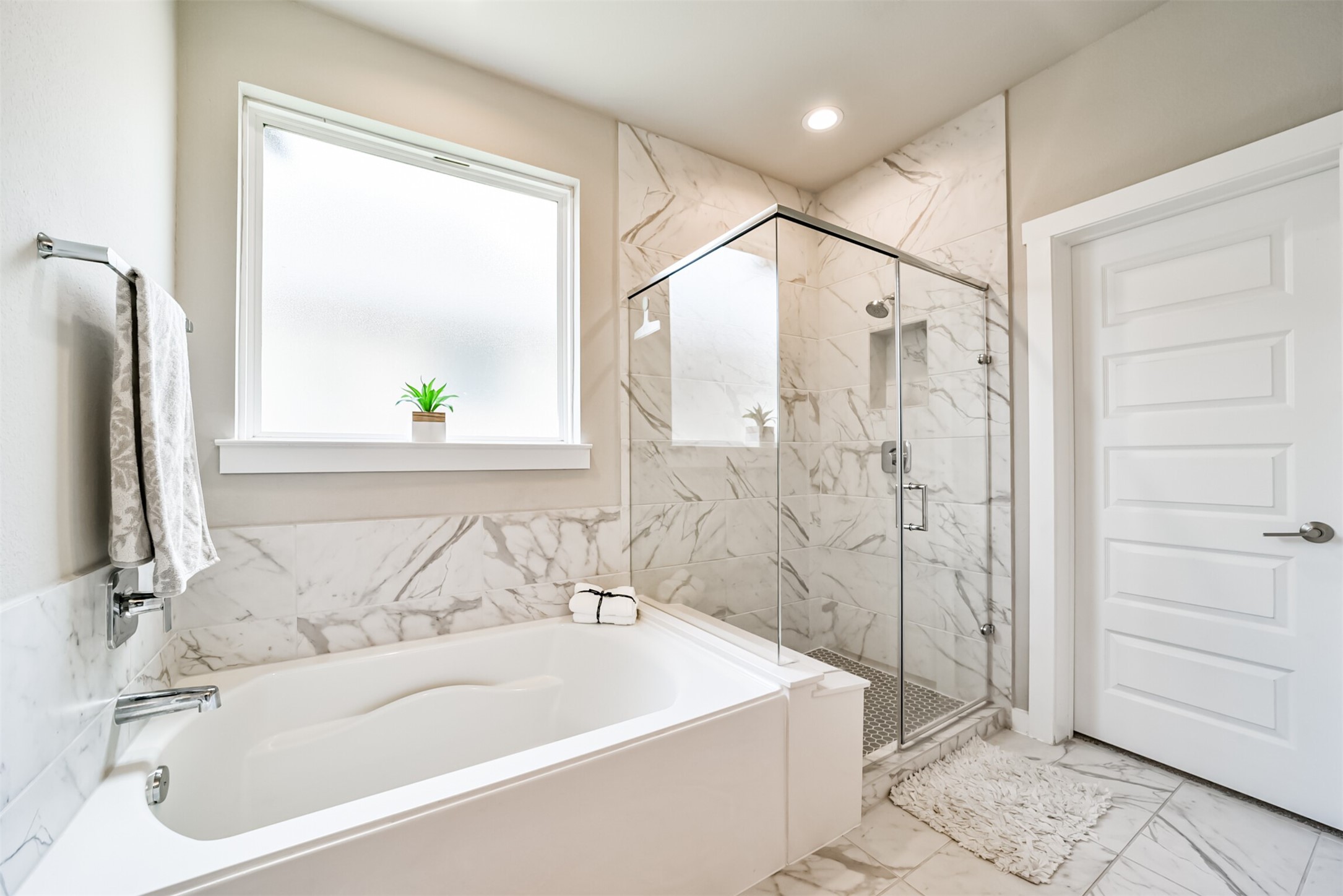 29510 Red Rocks Pk Drive Katy, TX 77494 - Photo 18 of 31 a bathroom with a bathtub and a shower
