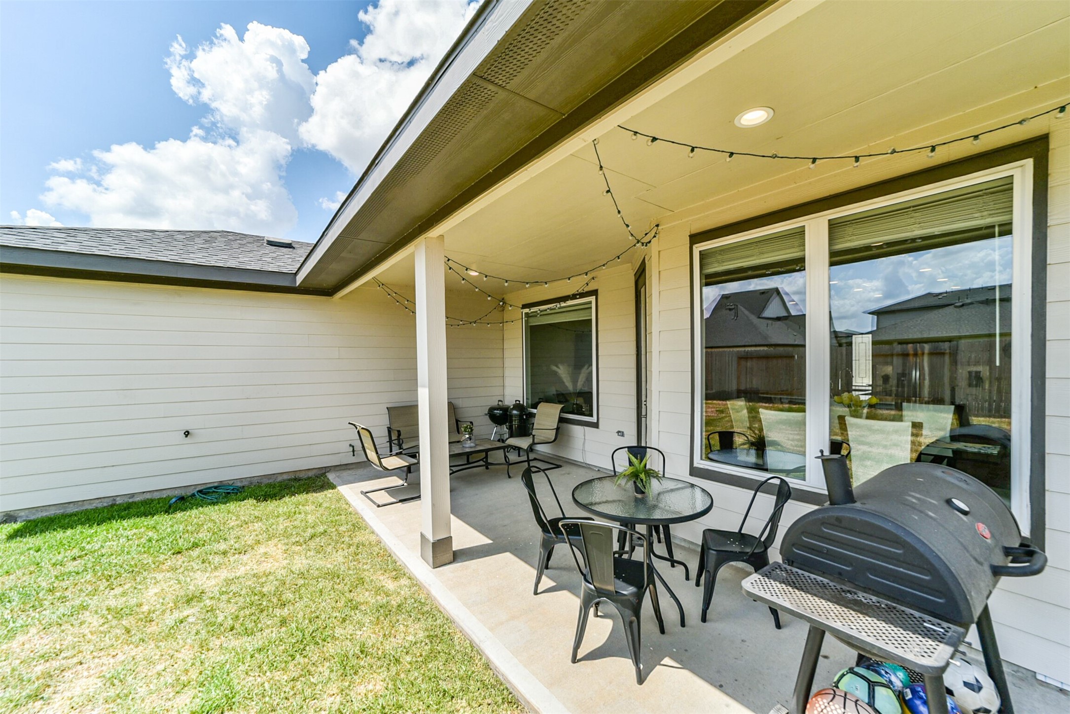 29510 Red Rocks Pk Drive Katy, TX 77494 - Photo 29 of 31 a view of a patio with table and chairs and potted plants