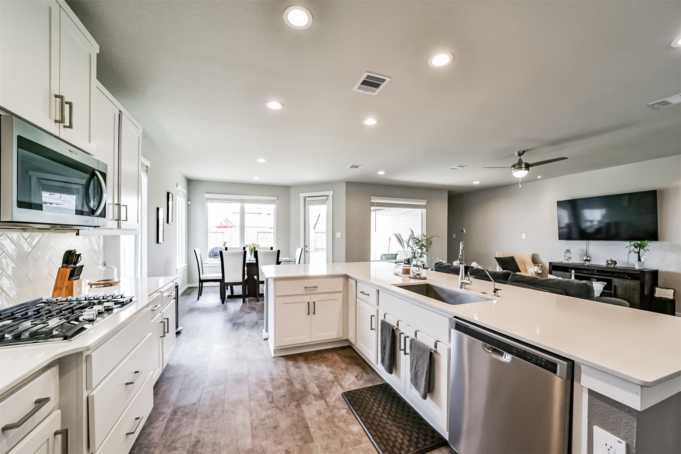 29510 Red Rocks Pk Drive Katy, TX 77494 - Photo 10 of 31 a kitchen with lots of counter top space a sink appliances and cabinets