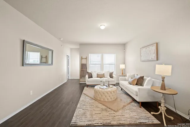 a living room with furniture window and a lamp