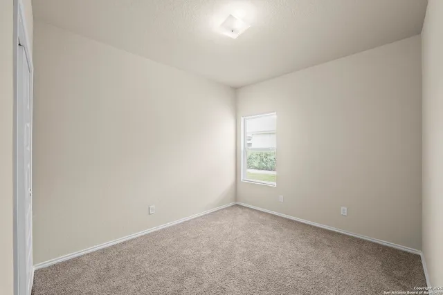 an empty room with a window